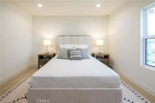 18848 Collins St, Tarzana, CA 91356 - bedroom featuring light wood-style floors, baseboards, and recessed lighting