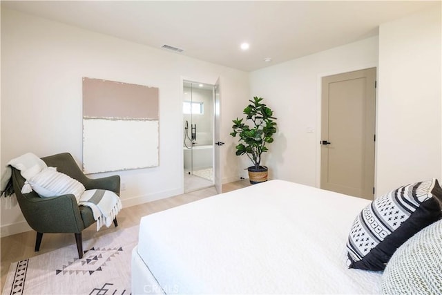 bedroom featuring light wood-type flooring, visible vents, baseboards, and recessed lighting