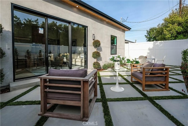 18848 Collins St, Tarzana, CA 91356 - view of patio featuring fence and an outdoor living space
