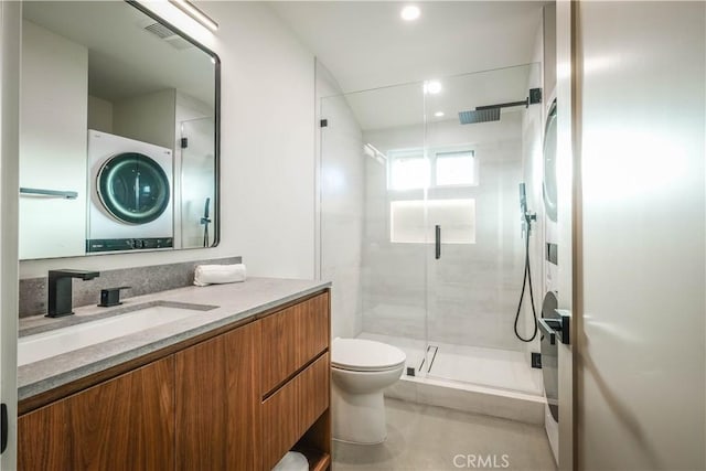 18848 Collins St, Tarzana, CA 91356 - full bath with stacked washer / drying machine, a shower stall, vanity, toilet, and recessed lighting