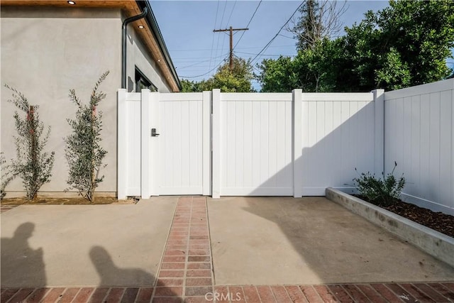 18848 Collins St, Tarzana, CA 91356 - gate featuring fence and a patio