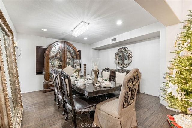 dining area featuring dark hardwood / wood-style flooring and french doors