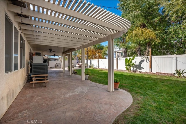 view of patio featuring ceiling fan and a pergola