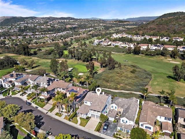 birds eye view of property featuring a mountain view