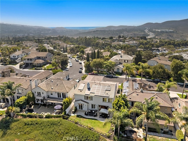 drone / aerial view featuring a mountain view