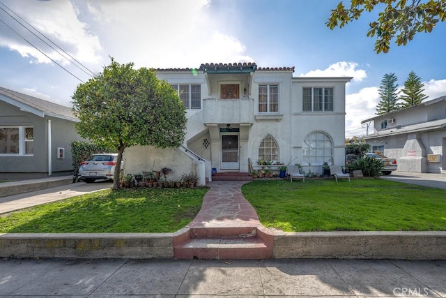 1314 E Harvard St, Glendale, CA 91205 - mediterranean / spanish-style home with a front yard and stucco siding