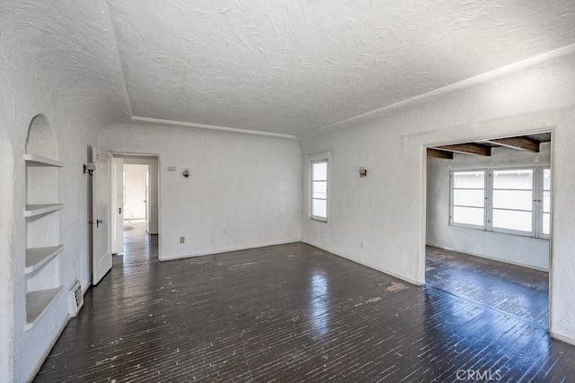 1314 E Harvard St, Glendale, CA 91205 - empty room featuring a textured ceiling and hardwood / wood-style floors
