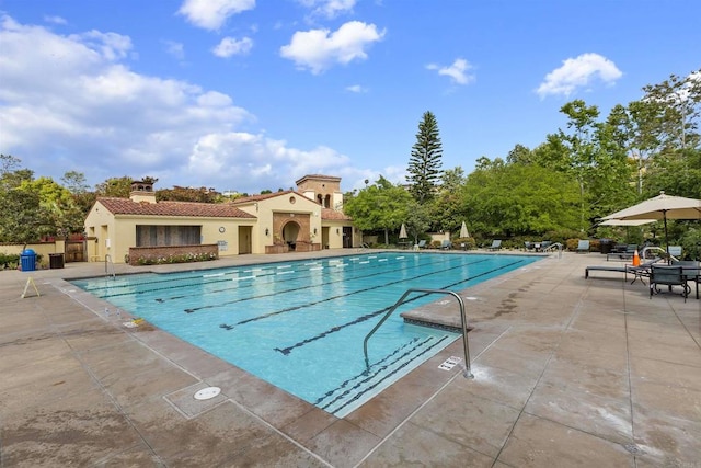 pool featuring a patio area