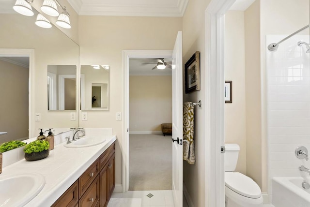 full bathroom with toilet, a sink, shower / washtub combination, double vanity, and crown molding