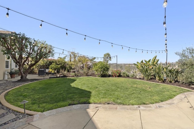 view of yard with a patio area and fence