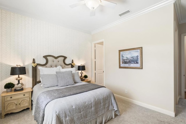 bedroom with crown molding, visible vents, light carpet, baseboards, and wallpapered walls