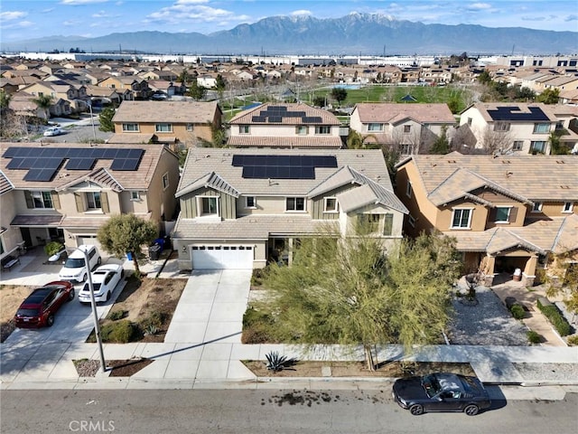 bird's eye view with a mountain view