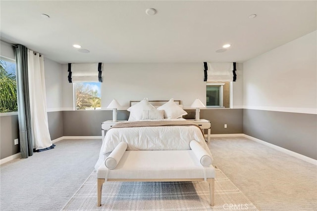 bedroom with light colored carpet