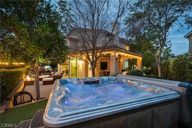 exterior space featuring a hot tub