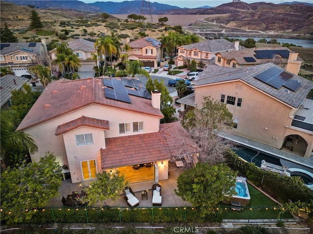 birds eye view of property featuring a residential view and a mountain view