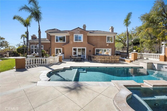 2503 N San Miguel Dr, Orange, CA 92867 - view of swimming pool with a patio area and a pool with connected hot tub