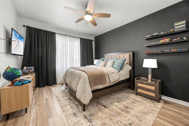 2503 N San Miguel Dr, Orange, CA 92867 - bedroom with wood finished floors and a ceiling fan