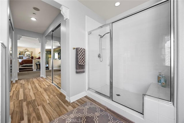 2503 N San Miguel Dr, Orange, CA 92867 - ensuite bathroom with wood finished floors, a shower stall, baseboards, and recessed lighting