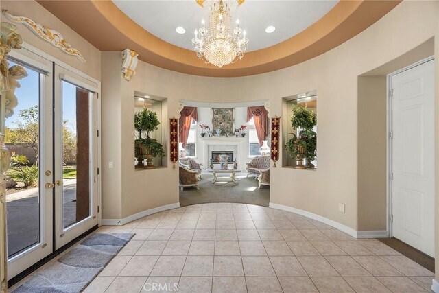 2503 N San Miguel Dr, Orange, CA 92867 - foyer with a chandelier, french doors, light tile patterned floors, baseboards, and recessed lighting
