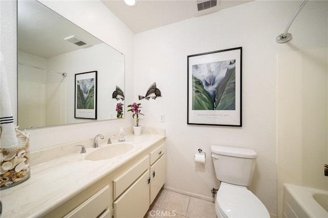 full bathroom with tile patterned floors, toilet, vanity, and tub / shower combination