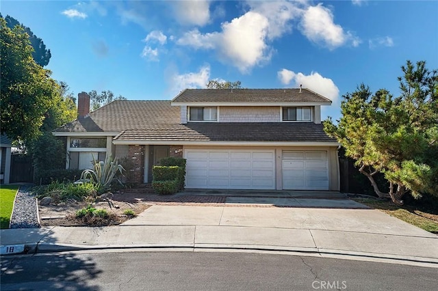 view of front of house with a garage