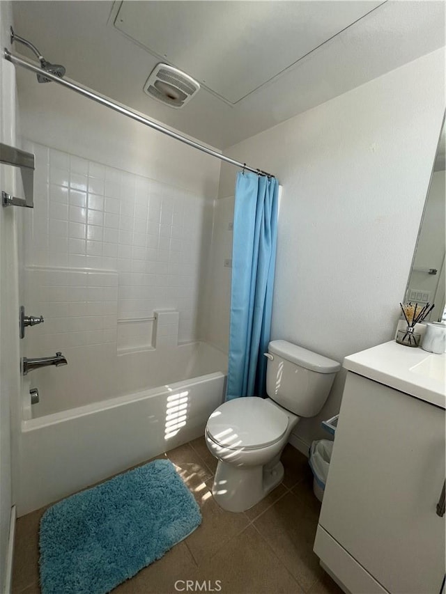 full bathroom featuring tile patterned flooring, toilet, vanity, visible vents, and shower / bath combo