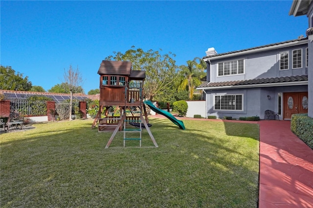 view of play area featuring a yard