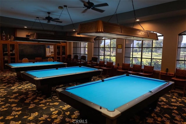 recreation room with ceiling fan, billiards, and carpet flooring