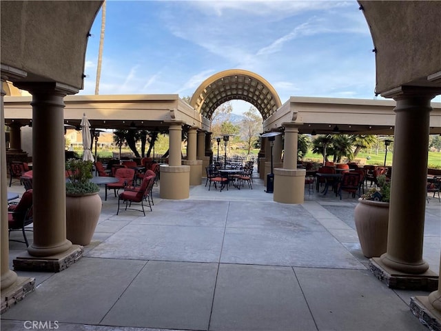 view of patio / terrace with a gazebo and outdoor dining space