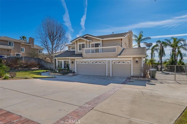 front facade with a garage and a balcony