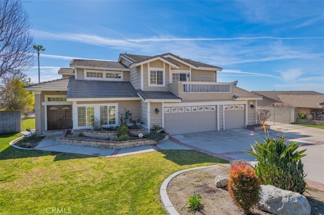 view of front of home featuring a front yard, a garage, and a balcony