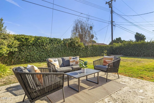 view of patio featuring outdoor lounge area and a fenced backyard