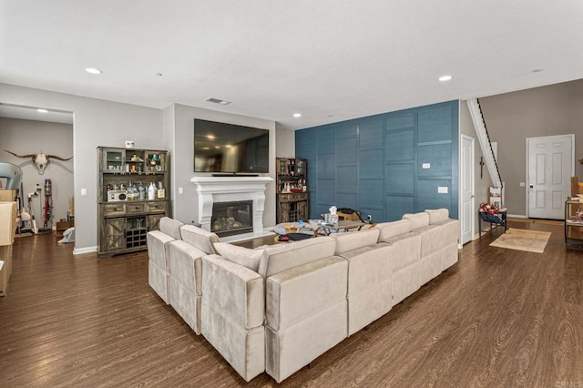 living room featuring dark hardwood / wood-style flooring