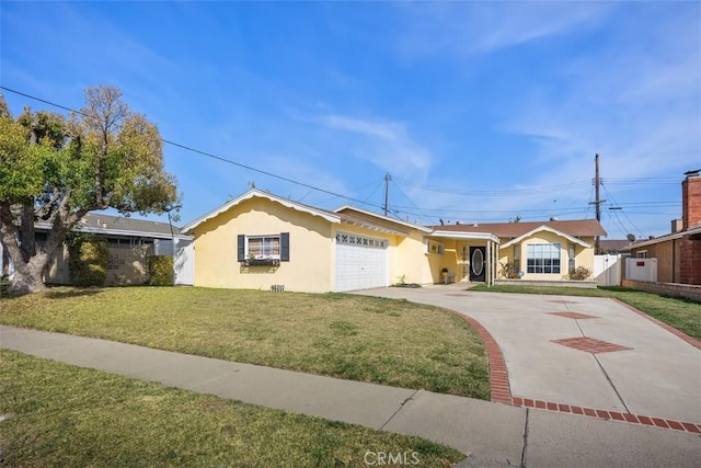 single story home featuring a front yard and a garage