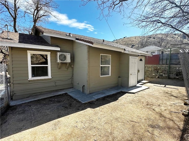 505 N Dr, Lebec, CA 93243 - rear view of property with ac unit and fence