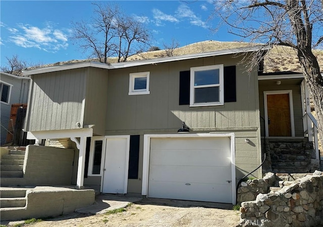 505 N Dr, Lebec, CA 93243 - view of front facade with dirt driveway and an attached garage