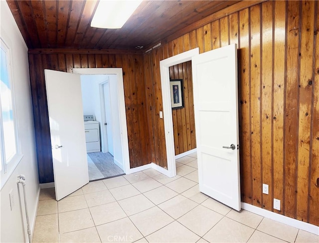 505 N Dr, Lebec, CA 93243 - spare room with washer / clothes dryer, wooden walls, and wood ceiling