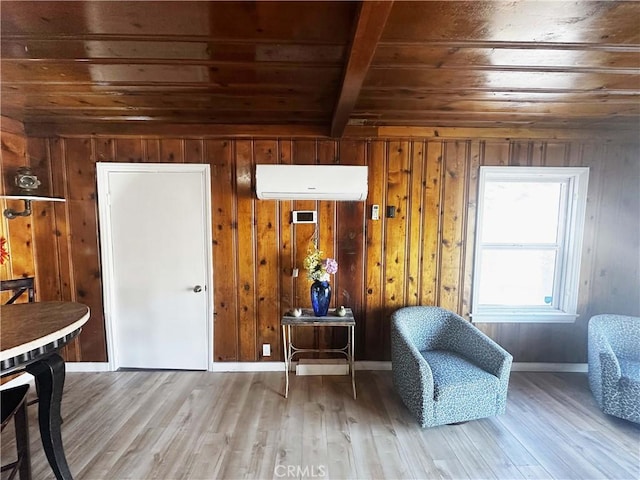 505 N Dr, Lebec, CA 93243 - living area with an AC wall unit, beamed ceiling, wood finished floors, and wood ceiling