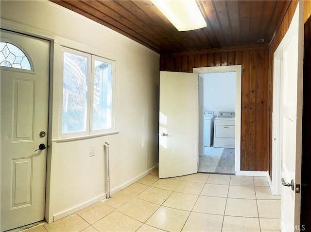 505 N Dr, Lebec, CA 93243 - foyer featuring washer and dryer, wooden ceiling, light tile patterned floors, and baseboards