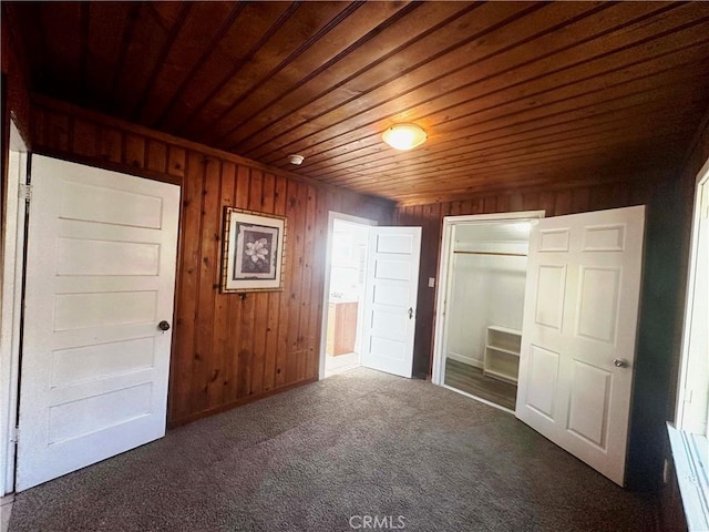 505 N Dr, Lebec, CA 93243 - unfurnished bedroom featuring a closet, carpet floors, wooden walls, and wooden ceiling
