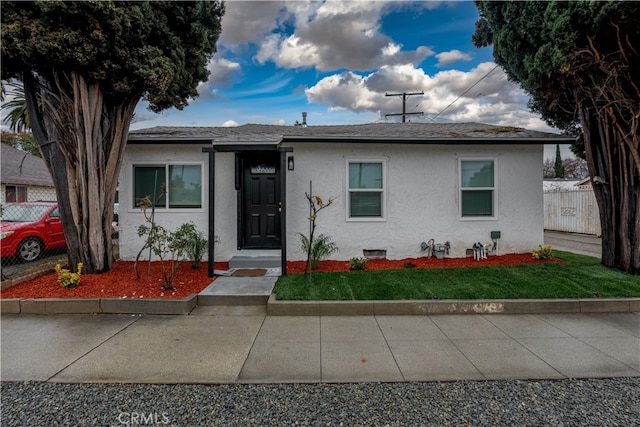 view of front of house with a front yard