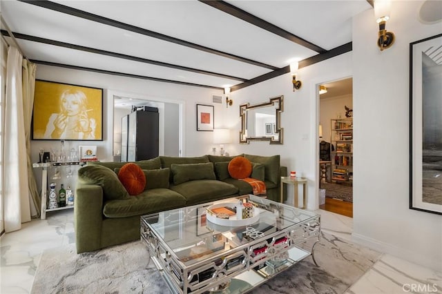 living room featuring beamed ceiling