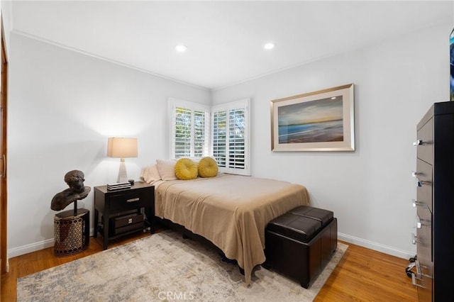 bedroom featuring hardwood / wood-style floors