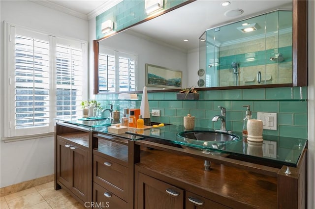 bathroom featuring tile patterned flooring, walk in shower, backsplash, ornamental molding, and vanity