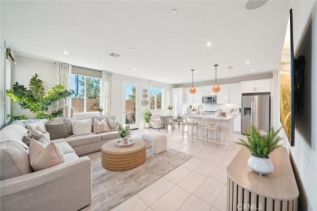 living room featuring light tile patterned flooring