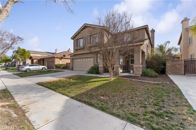 view of front facade featuring a front yard and a garage