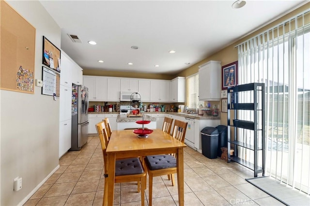 view of tiled dining space