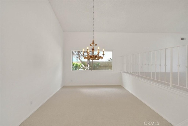 unfurnished room with baseboards, visible vents, an inviting chandelier, lofted ceiling, and light carpet