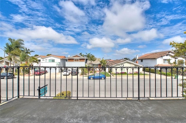 view of gate featuring a residential view