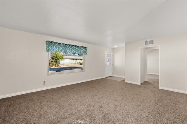 empty room with carpet flooring